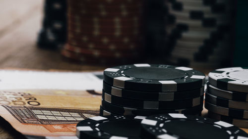 Close-up of coins on table