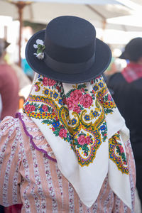 Rear view of woman in headscarf and top hat