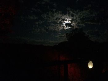 View of illuminated tunnel at night