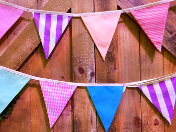 Close-up of multi colored umbrellas hanging outdoors