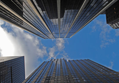 Low angle view of modern buildings against sky