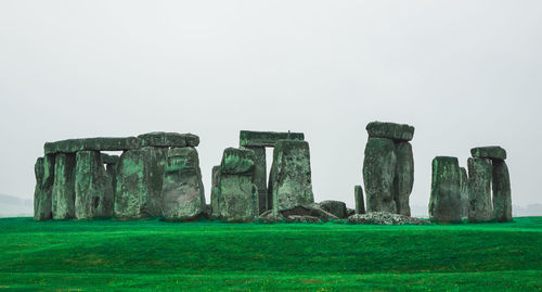 Built structure on field against clear sky