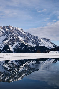 Scenic view of snowcapped mountains against sky