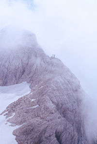 Scenic view of mountain against sky during winter