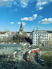 High angle view of street and buildings against sky