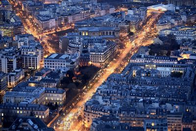 High angle view of illuminated cityscape at night