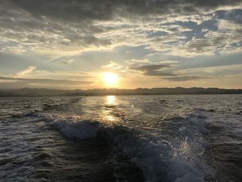 Scenic view of sea against sky during sunset