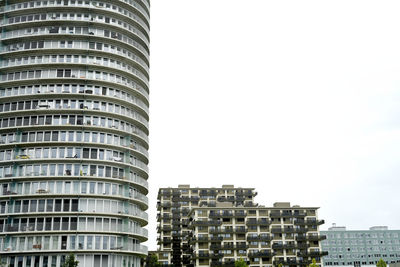 Low angle view of skyscrapers against sky