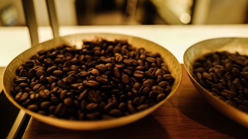 Close-up of coffee beans on table