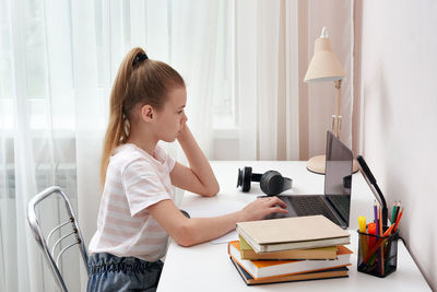 Girl attending online class