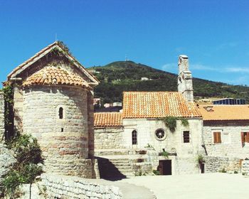 Low angle view of temple against blue sky