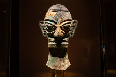 A bronze head from the sanxingdui archaeological site of bronze age in guanghan, china.