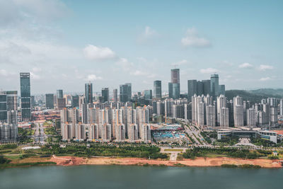 Modern buildings against sky in city