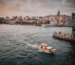 High angle view of river by buildings in city