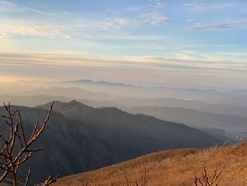 Scenic view of mountains against sky during sunset