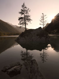 Scenic view of lake against sky during sunset