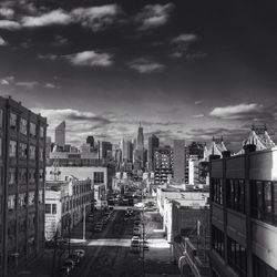 Buildings in city against sky