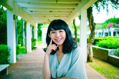 Portrait of smiling young woman