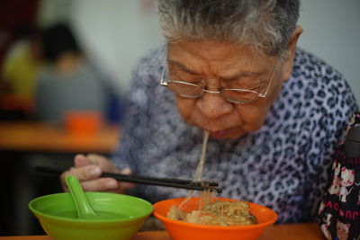 Close-up of man preparing food
