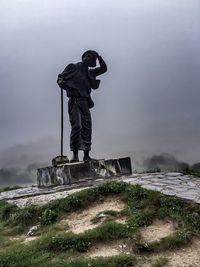 Low angle view of statue against sky