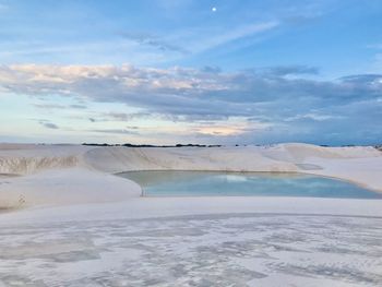 White sand dunes and lagoons formed by rainwater.