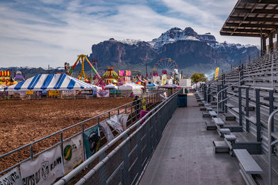 Panoramic view of buildings and mountains against sky