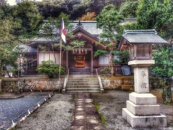 Exterior of house by trees and building