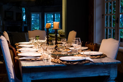 Empty chairs and tables at dining table