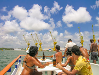 People doing party on boat deck