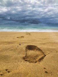 Scenic view of beach against sky