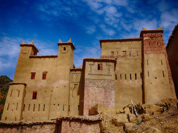 Low angle view of historic building against sky