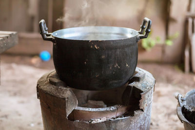 Close-up of food being prepared on camping stove