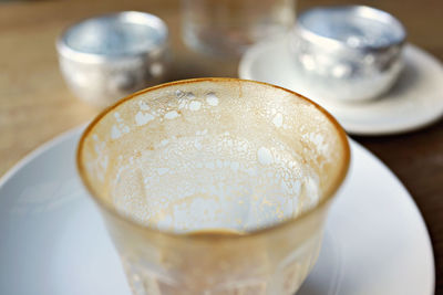 Close-up of leftovers in coffee cup