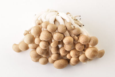 Close-up of candies against white background