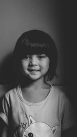 Portrait of young kids against black background