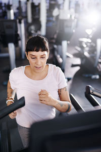 Woman exercising at gym