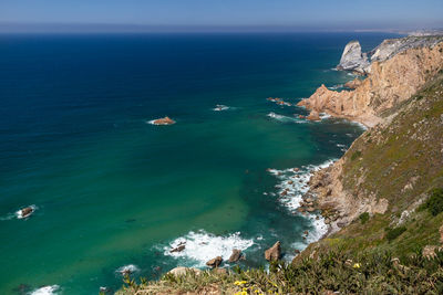 High angle view of sea and rocks