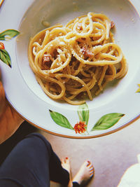 High angle view of noodles in plate on table