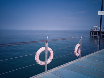 Scenic view of sea against blue sky