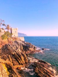 Scenic view of sea against clear blue sky