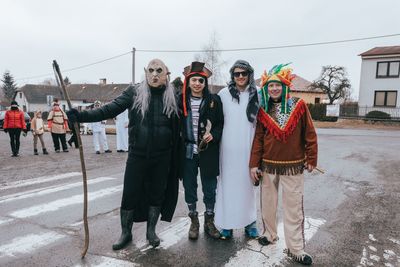 Portrait of young people standing in winter