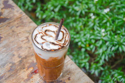 Close-up of cappuccino served on table