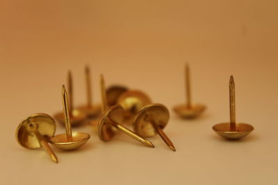 Close-up of candles on table against white background