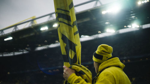 Close-up of illuminated yellow light at night