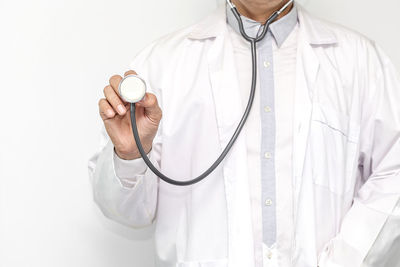 Midsection of person standing on white background