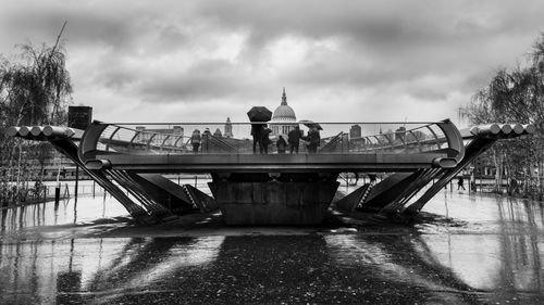 People standing on boat against sky