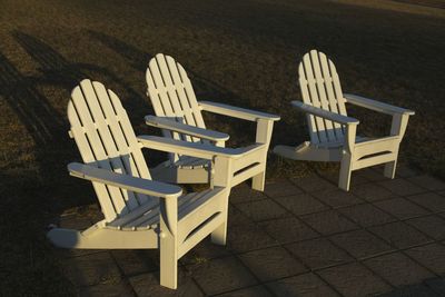 Adirondack chairs at sunset