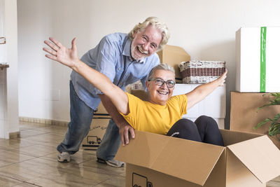 Portrait of smiling senior people enjoying home