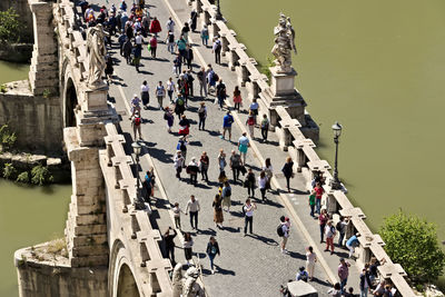 High angle view of people walking on street