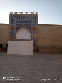 Entrance of historic building against sky